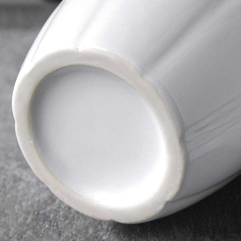 ספל בעיצוב עם ידית אקדח מאוד ייחודית 